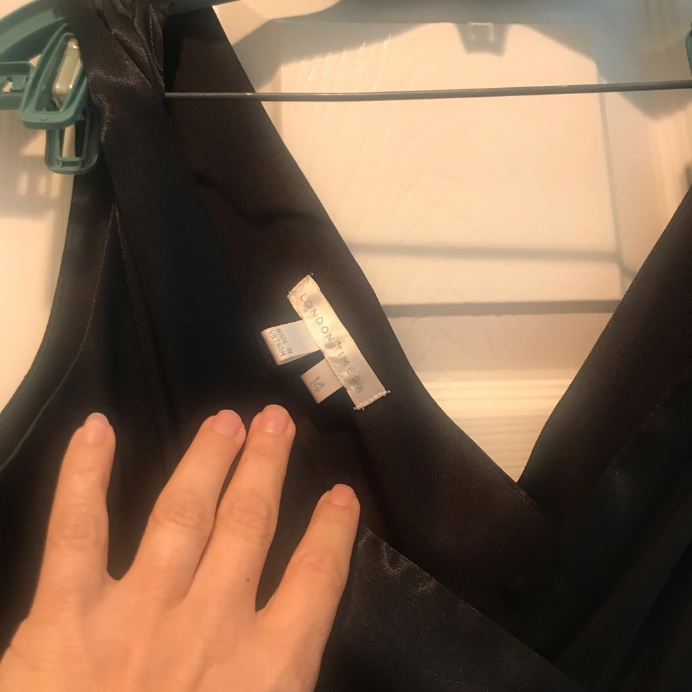 Black dress. Wore it once to a wedding.